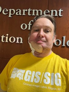 Picture of me in front of the radiation therapy wearing my GISSIG shirt from this year's conference.  